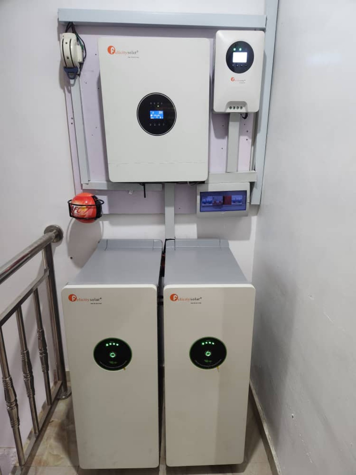 Wall-mounted Felicity solar inverter with two lithium batteries